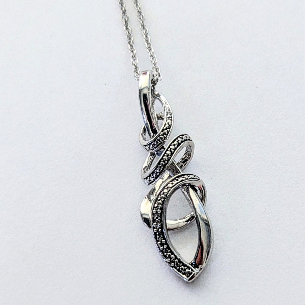 Lovely Sterling Silver Diamond Accent Twist Pendant Necklace Zales 18"